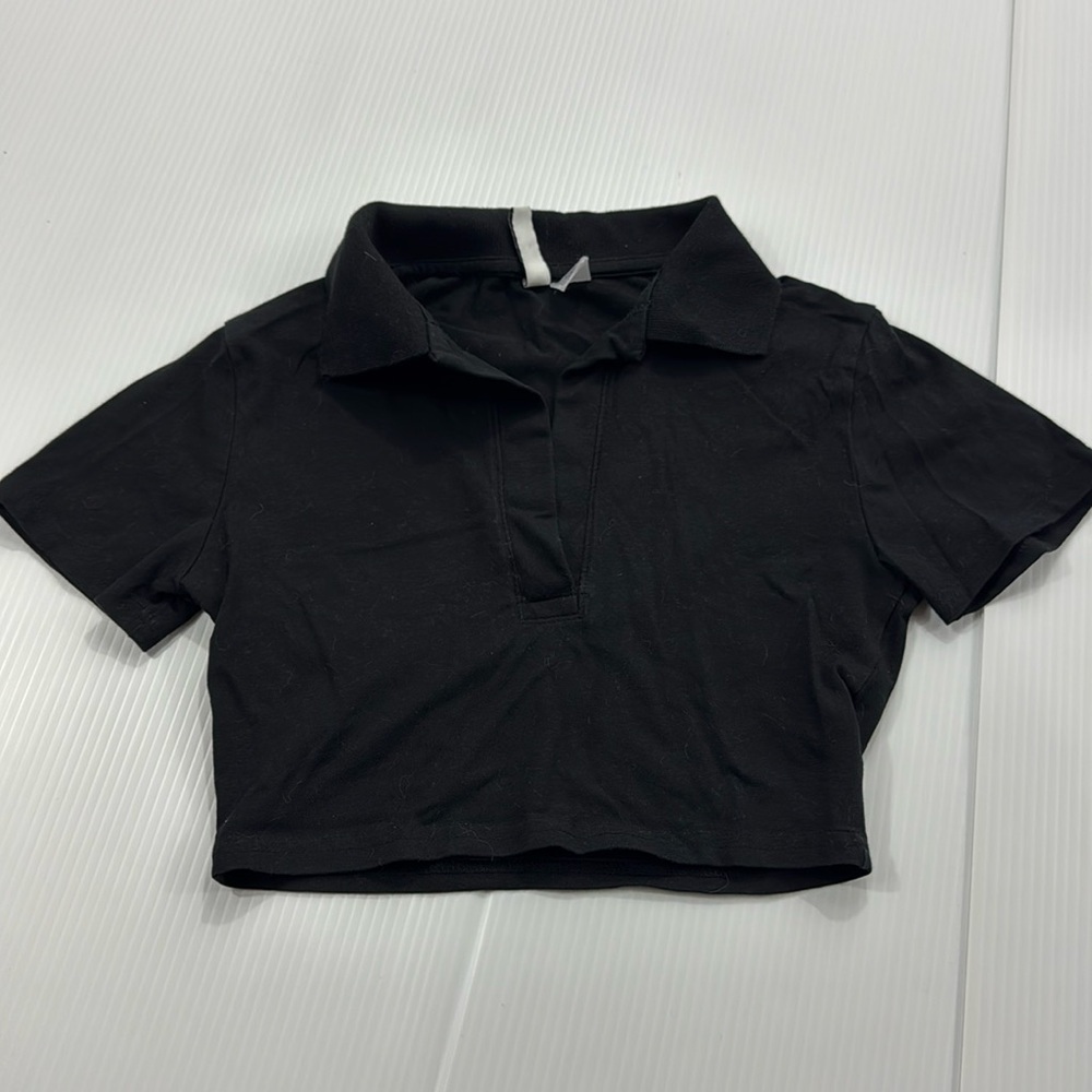 J30. Divided Black Crop Top (XS)